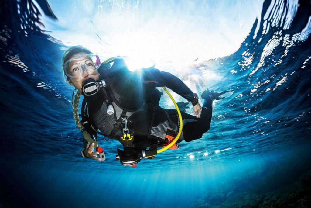 Scuba diver gliding through open water