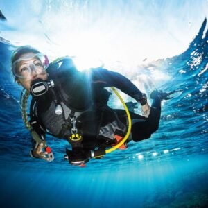 Scuba diver gliding through open water