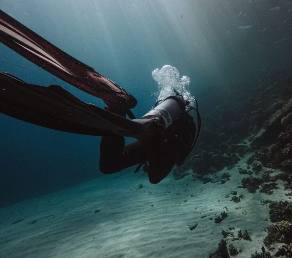 Scuba diver exploring a vibrant reef